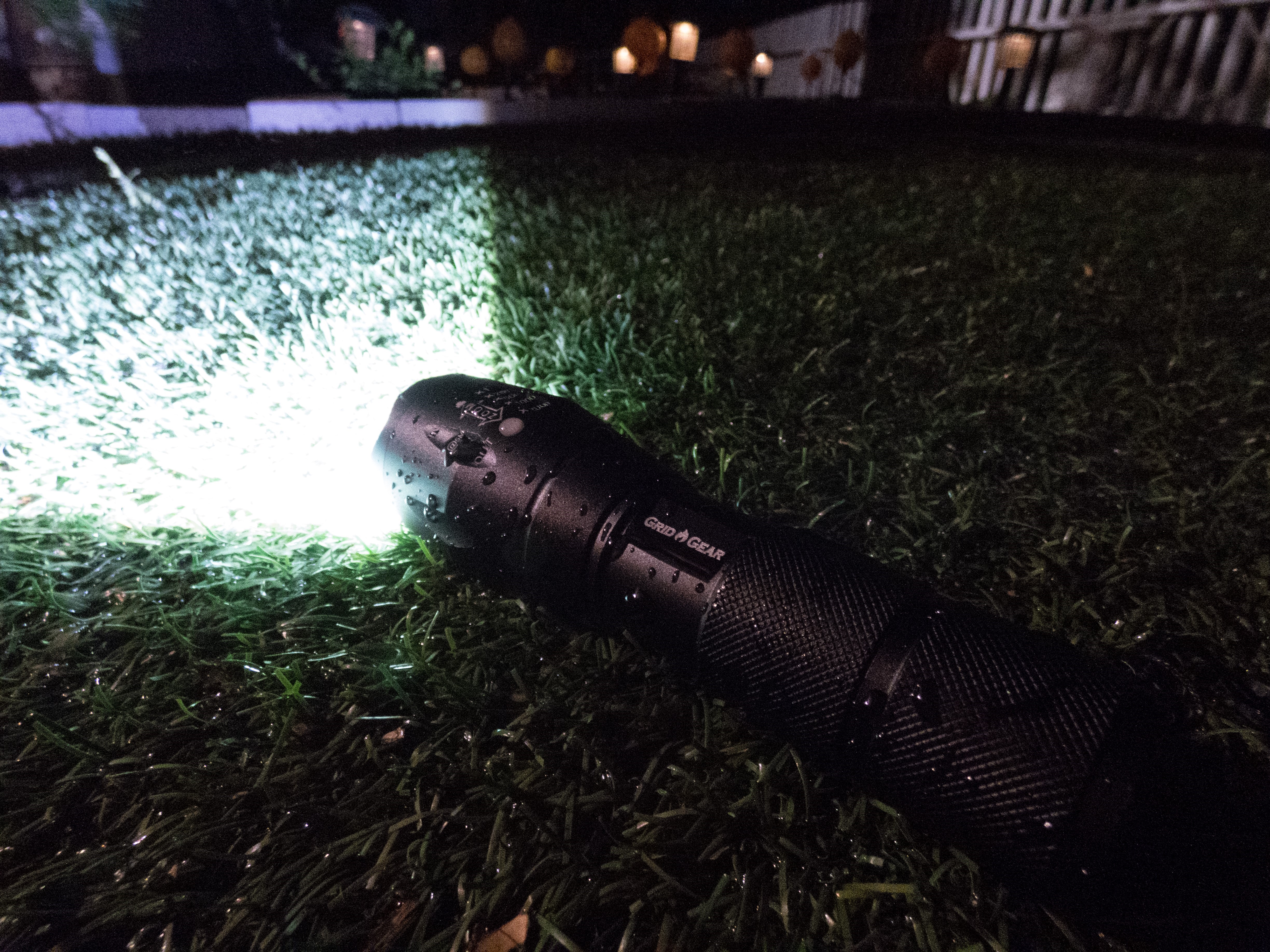 flashlight in rain at night